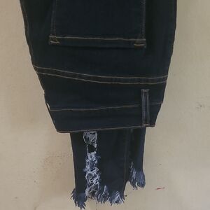 Distressed Dark Blue Denim Jeans